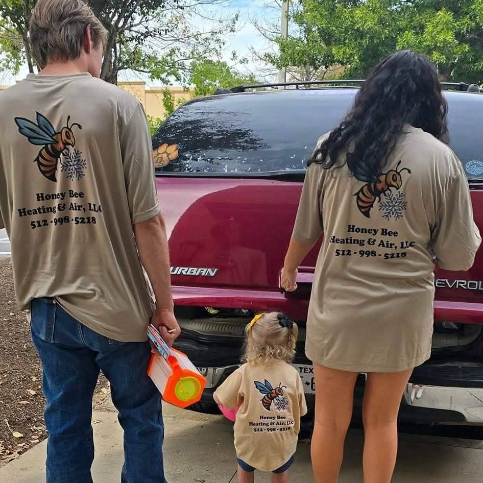Multiple outdoor air conditioning units lined up on a rooftop, providing cooling for a commercial building